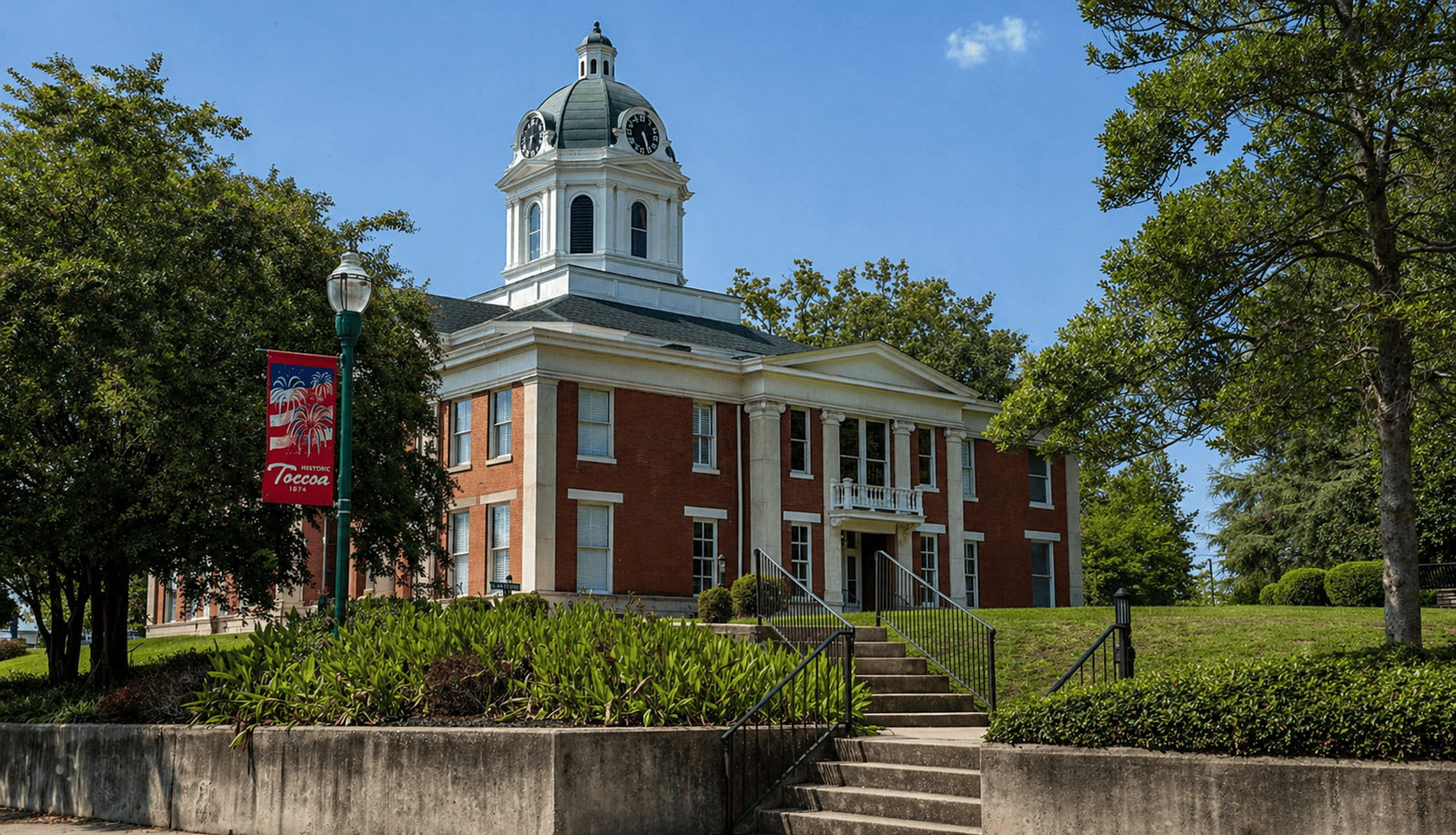 Historic courthouse building in Toccoa, Georgia, showcasing classic architecture and a prominent clo.
