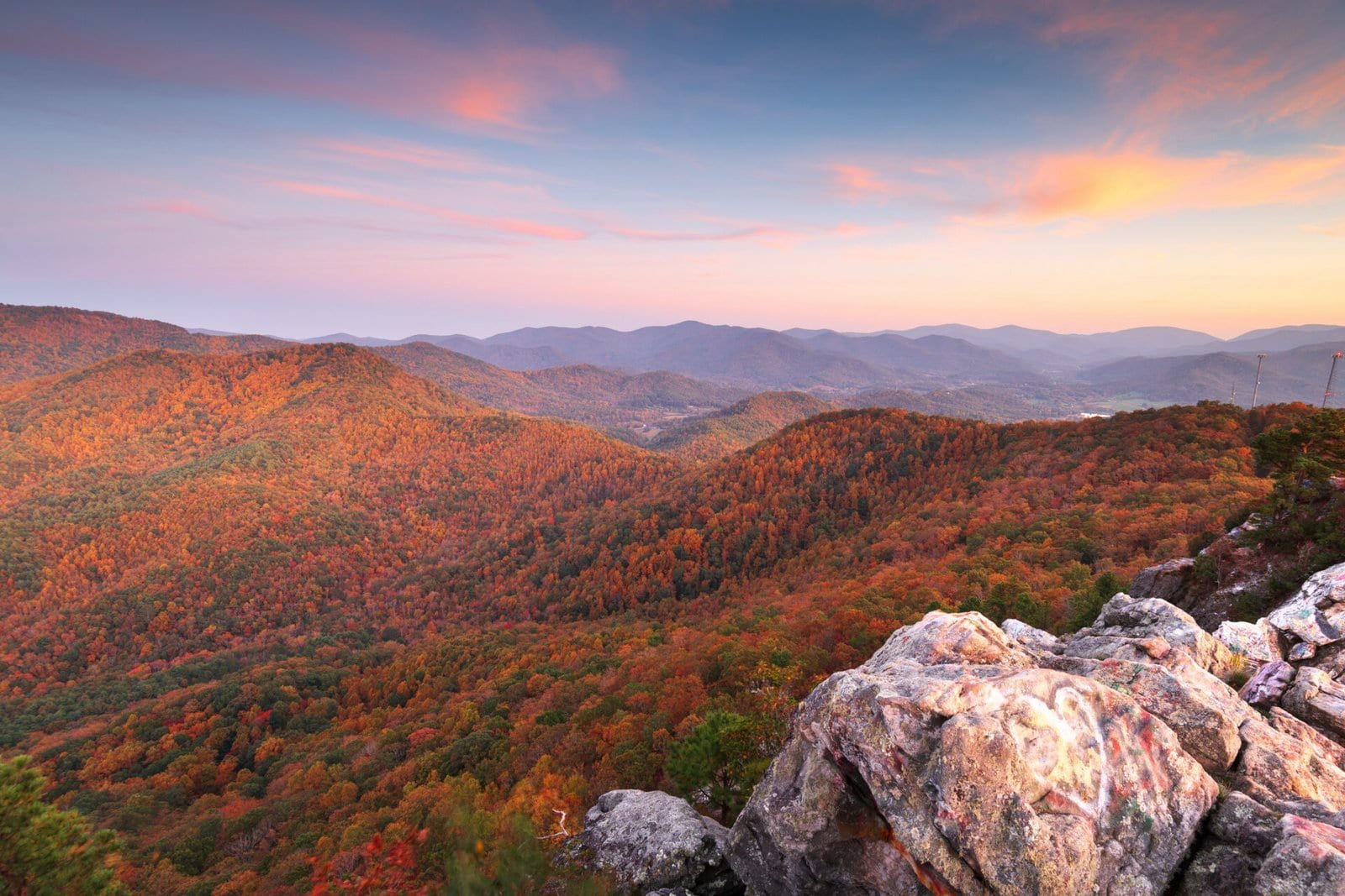 Scenic view of Hiawassee, GA with colorful fall foliage and rolling mountains. Perfect for outdoor a.